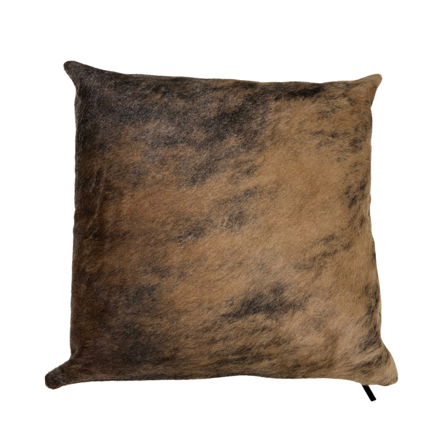Exotic brindle cowhide cushion showing natural hair texture and layered tonal variation