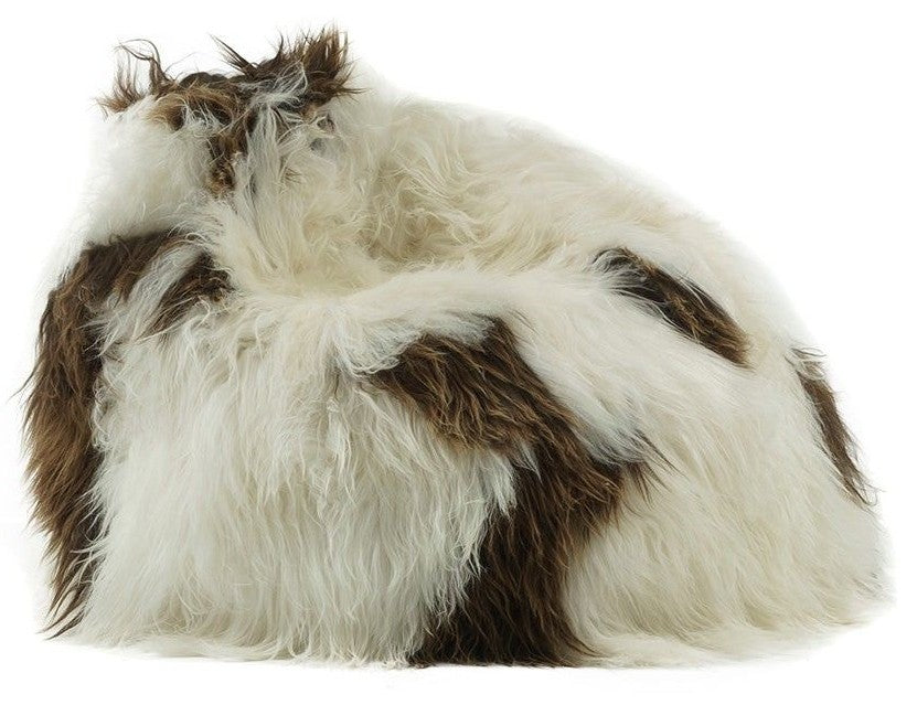 Icelandic sheepskin bean bag in natural brown and white spot photographed on a white background