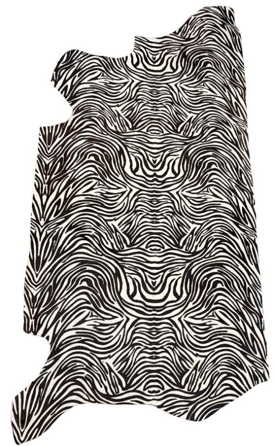 Zebra print cowhide side in black pattern on natural hide displayed as a full leather side