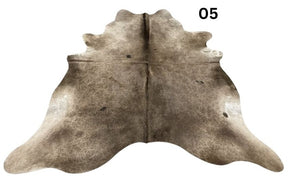 Dark Champagne cowhide rug No. 05 showcasing one-of-a-kind natural colour variation.