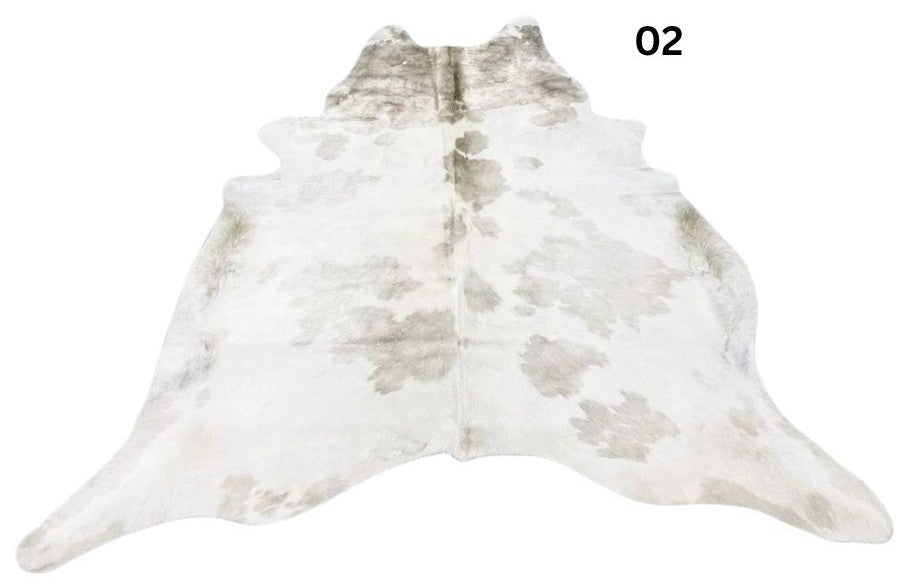 Beige and white special cowhide rug 02 featuring natural markings, genuine hair-on-hide leather and one-of-a-kind patterning.
