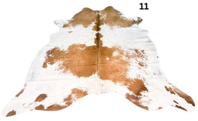 Beige and white special cowhide rug 11 featuring natural markings, genuine hair-on-hide leather and one-of-a-kind patterning.