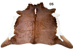 Brown and white Hereford cowhide rug 05 with a symmetrical pattern on a white background