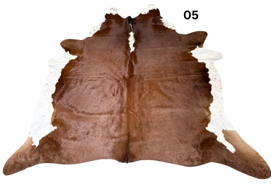 Brown and white Hereford cowhide rug 05 with a symmetrical pattern on a white background