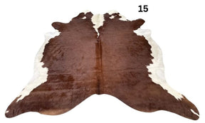 Brown and white Hereford cowhide rug 15 with a symmetrical pattern on a white background