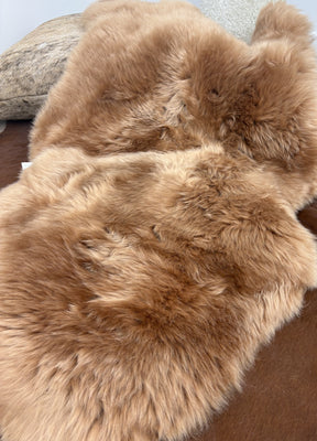 Close-up of butterscotch Merino sheepskin rug showing soft dense wool