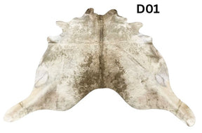 Champagne cowhide rug number 01 with soft neutral tones and natural markings on a white background