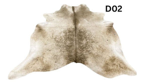 Champagne cowhide rug number 02 with soft neutral tones and natural markings on a white background