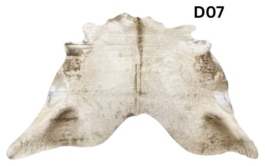 Champagne cowhide rug number 07 with soft neutral tones and natural markings on a white background