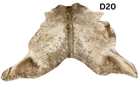 Champagne cowhide rug number 20 with soft neutral tones and natural markings on a white background