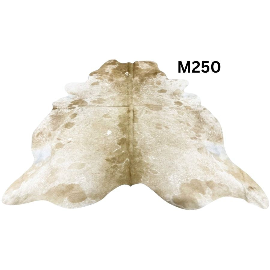 Beige and white cowhide rug with natural tonal variation shown on a white background