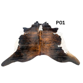 White belly cowhide rug with white spine and natural tonal variation shown on a white background