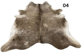 Dark Champagne cowhide rug No. 04 with rich neutral tones and organic markings.