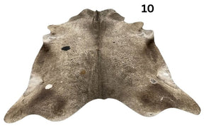 Dark Champagne cowhide rug No. 10 with a natural hair-on-hide finish.