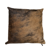 Exotic brindle cowhide cushion showing natural hair texture and layered tonal variation