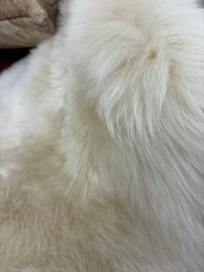 Close-up of fawn Merino sheepskin rug showing soft dense wool