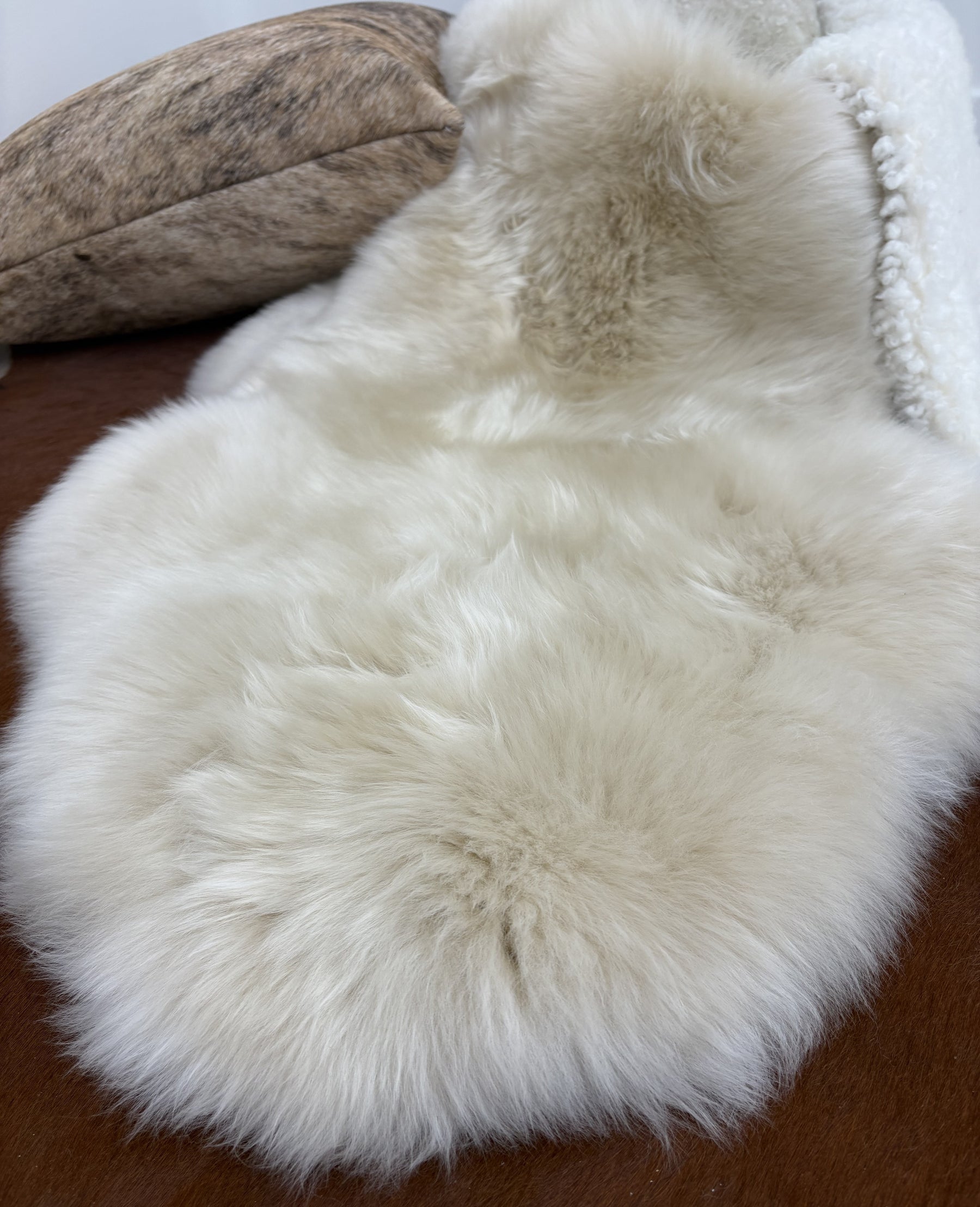 Close-up of fawn Merino sheepskin rug showing soft dense wool