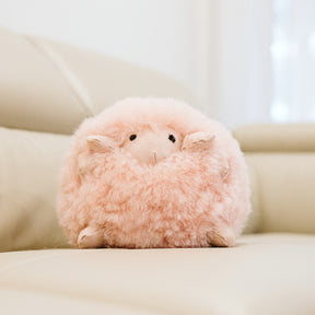 Front view of Geraldine sheepskin toy made from natural blush sheepskin