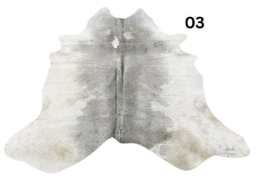 Grey cowhide rug number 03 with soft tonal variation and natural markings on a white background