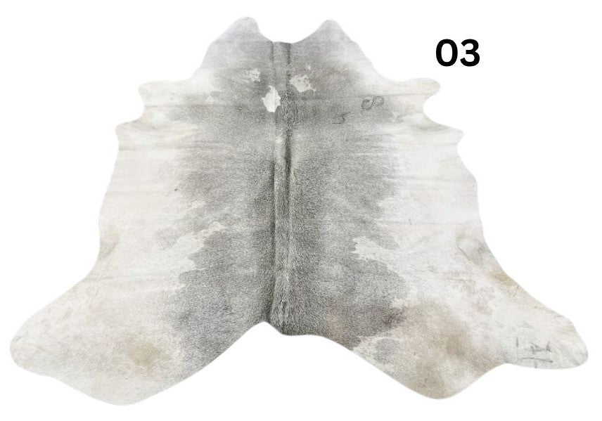 Grey cowhide rug number 03 with soft tonal variation and natural markings on a white background