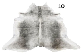 Grey cowhide rug number 10 with soft tonal variation and natural markings on a white background