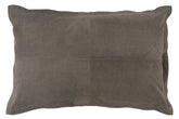 Grey nubuck leather cushion with soft matte finish and velvety texture