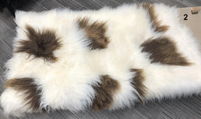 Icelandic sheepskin floor rug individual hide with natural brown and white spot pattern