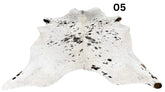 Light speckled longhorn cowhide rug number 05 with soft tonal variation and natural markings on a white background