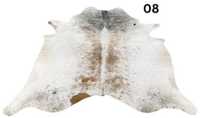 Light speckled longhorn cowhide rug number 08 with soft tonal variation and natural markings on a white background