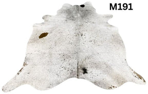 Light speckled longhorn cowhide rug number 191 with soft tonal variation and natural markings on a white background
