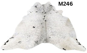 Light speckled longhorn cowhide rug number 246 with soft tonal variation and natural markings on a white background