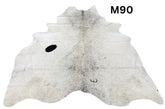 Light speckled longhorn cowhide rug number 90 with soft tonal variation and natural markings on a white background