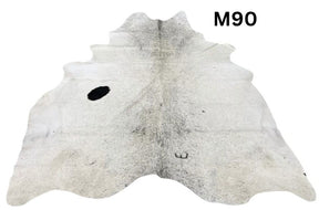 Light speckled longhorn cowhide rug number 90 with soft tonal variation and natural markings on a white background