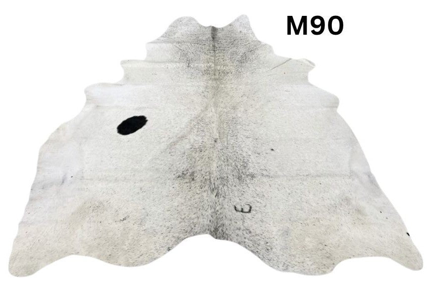 Light speckled longhorn cowhide rug number 90 with soft tonal variation and natural markings on a white background