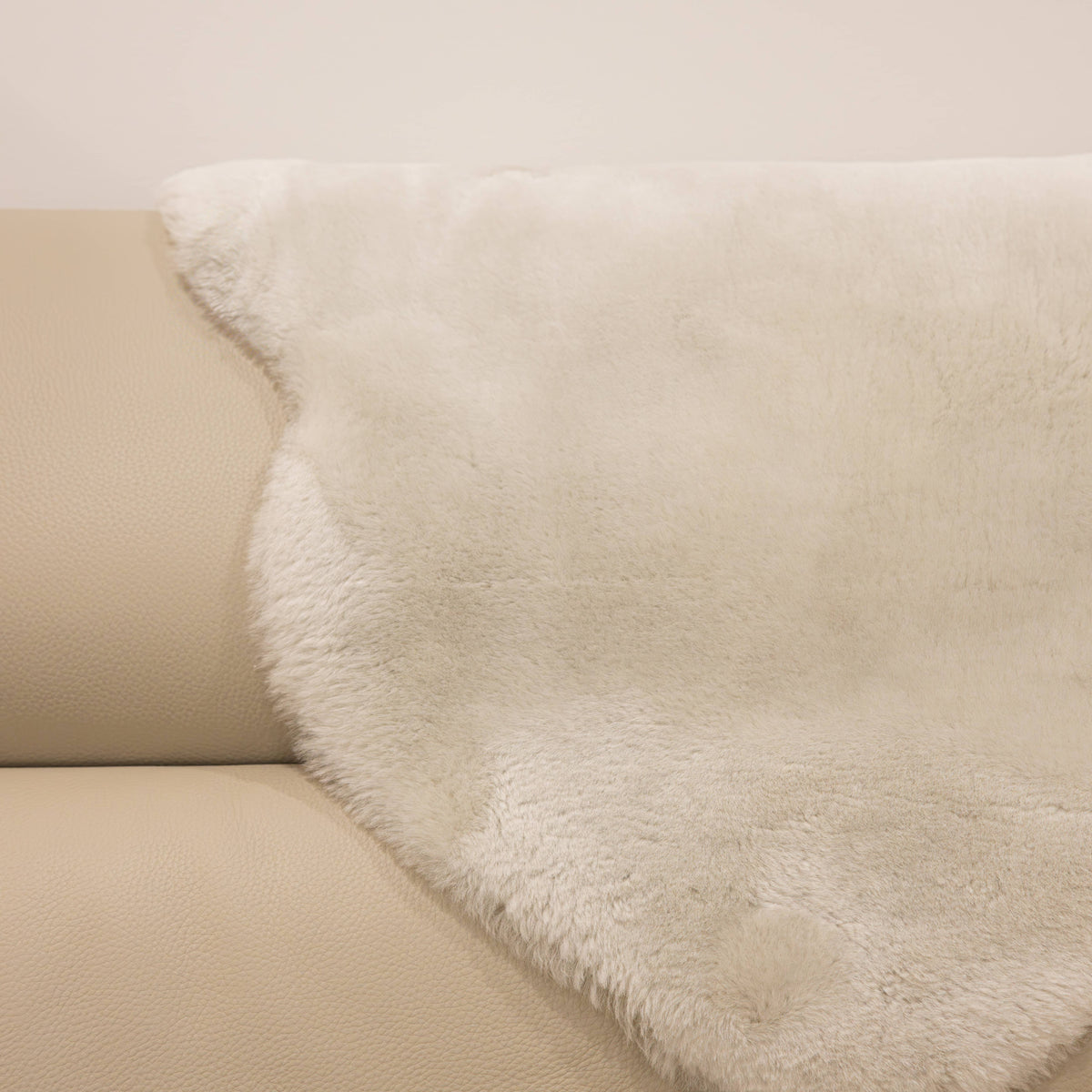 Linen sheepskin baby rug with soft natural wool and light neutral tone