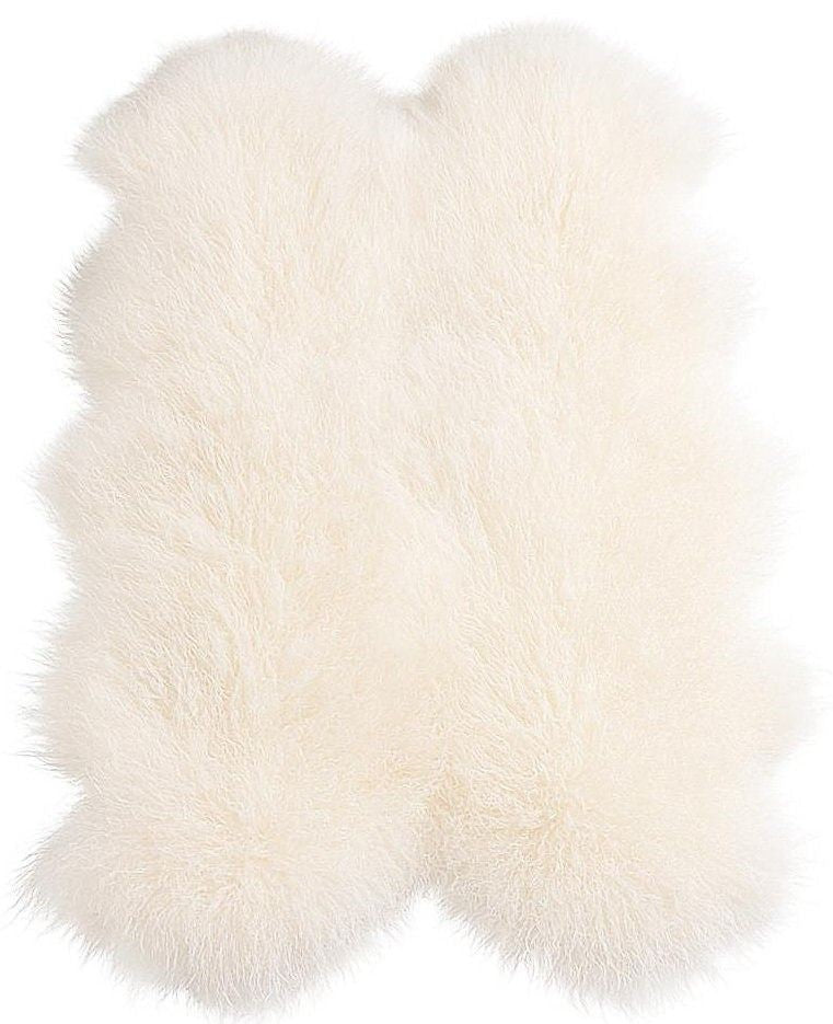 Natural white Mongolian sheepskin area rug made from four hides on a white background