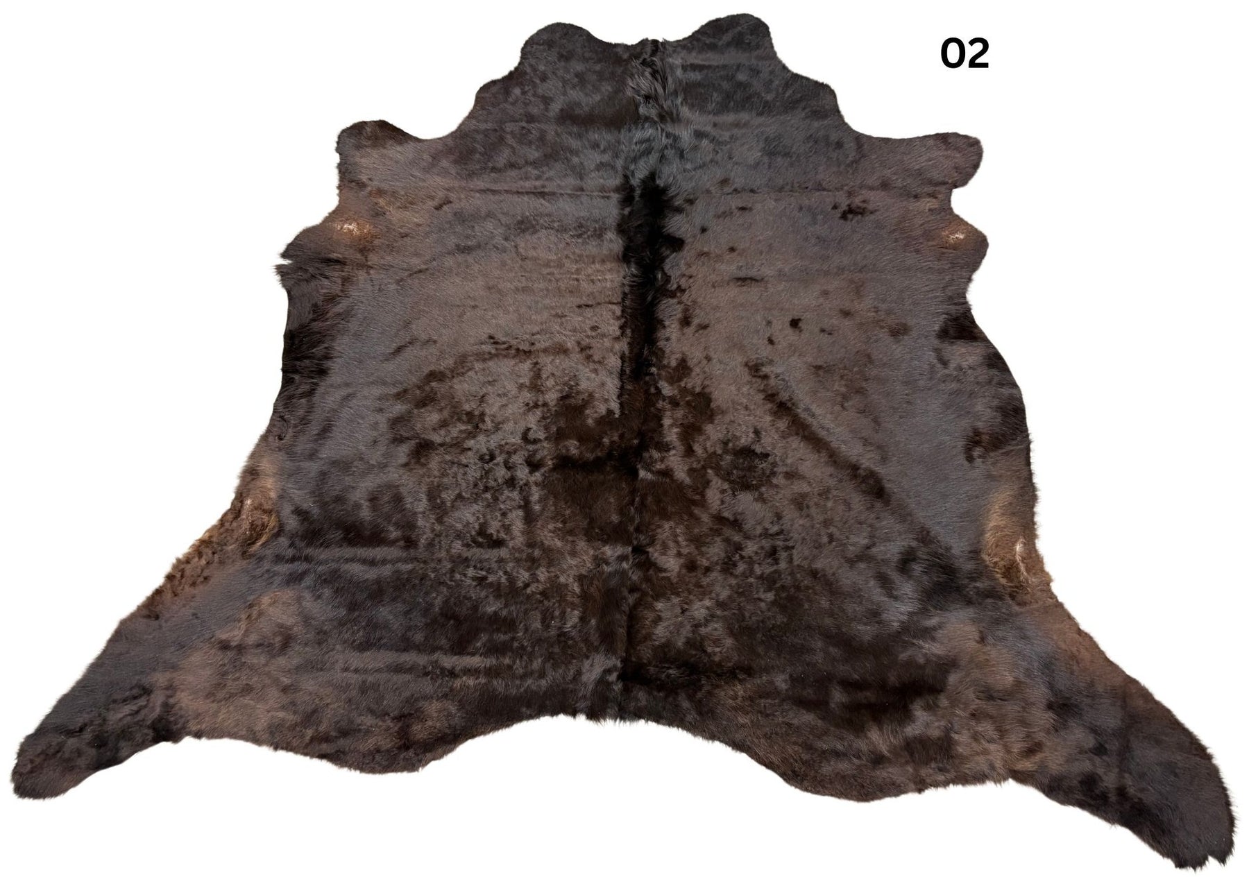 Natural black cowhide rug number 02 with subtle tonal variation and natural markings on a white background