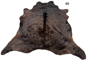 Natural black cowhide rug number 02 with subtle tonal variation and natural markings on a white background