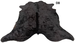 Natural black cowhide rug number 08 with subtle tonal variation and natural markings on a white background