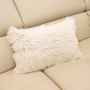New Zealand sheepskin lumbar cushion in linen with soft long wool texture displayed on a beige sofa