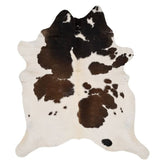 Large reddish brown cowhide rug example showing natural markings and colour variation on a white background