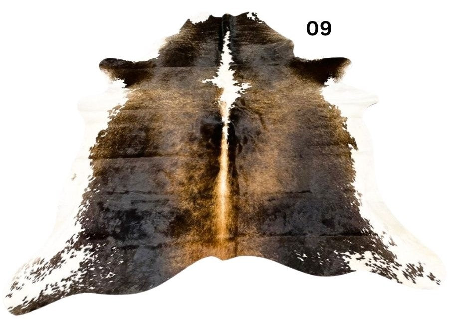 Reddish brown cowhide rug small size hide 09 genuine hide with lighter base and scattered brown markings displayed on white background