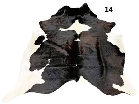 Reddish brown cowhide rug small size hide 14 genuine hide with lighter base and scattered brown markings displayed on white background