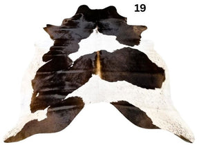 Reddish brown cowhide rug small size hide 19 genuine hide with lighter base and scattered brown markings displayed on white background