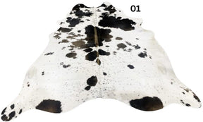 Reddish brown and white cowhide rug number 01 with natural markings and speckled pattern on a white background