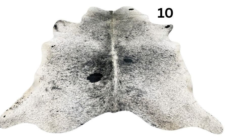 Salt and pepper cowhide rug number 10 with natural markings on a white background