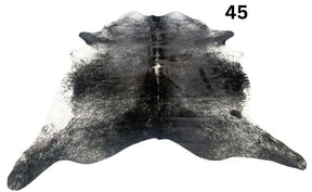 Salt and pepper cowhide rug number 45 with natural markings on a white background