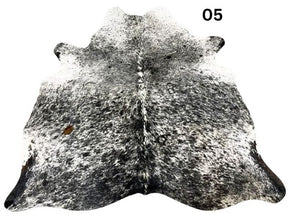 Salt and pepper cowhide rug number 05 with light base tones and fine speckled markings on a white background