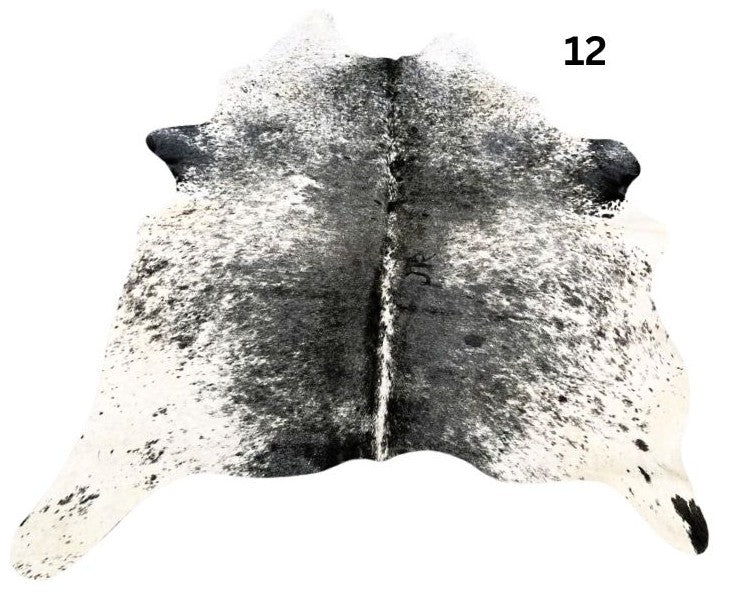 Salt and pepper cowhide rug number 12 with light base tones and fine speckled markings on a white background