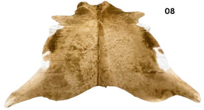 Solid beige cowhide rug number 08 with soft even tones and natural markings on a white background
